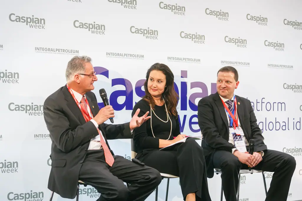 Speakers in conversation during the eco-tourism session