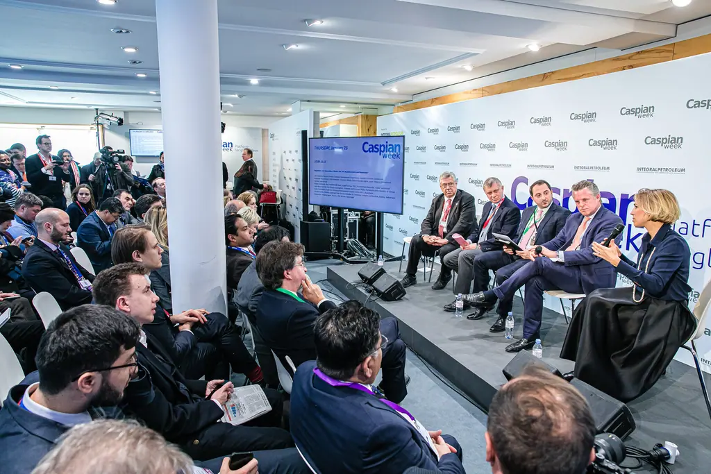 A wide view of the session on regulation and innovation, panel and audience